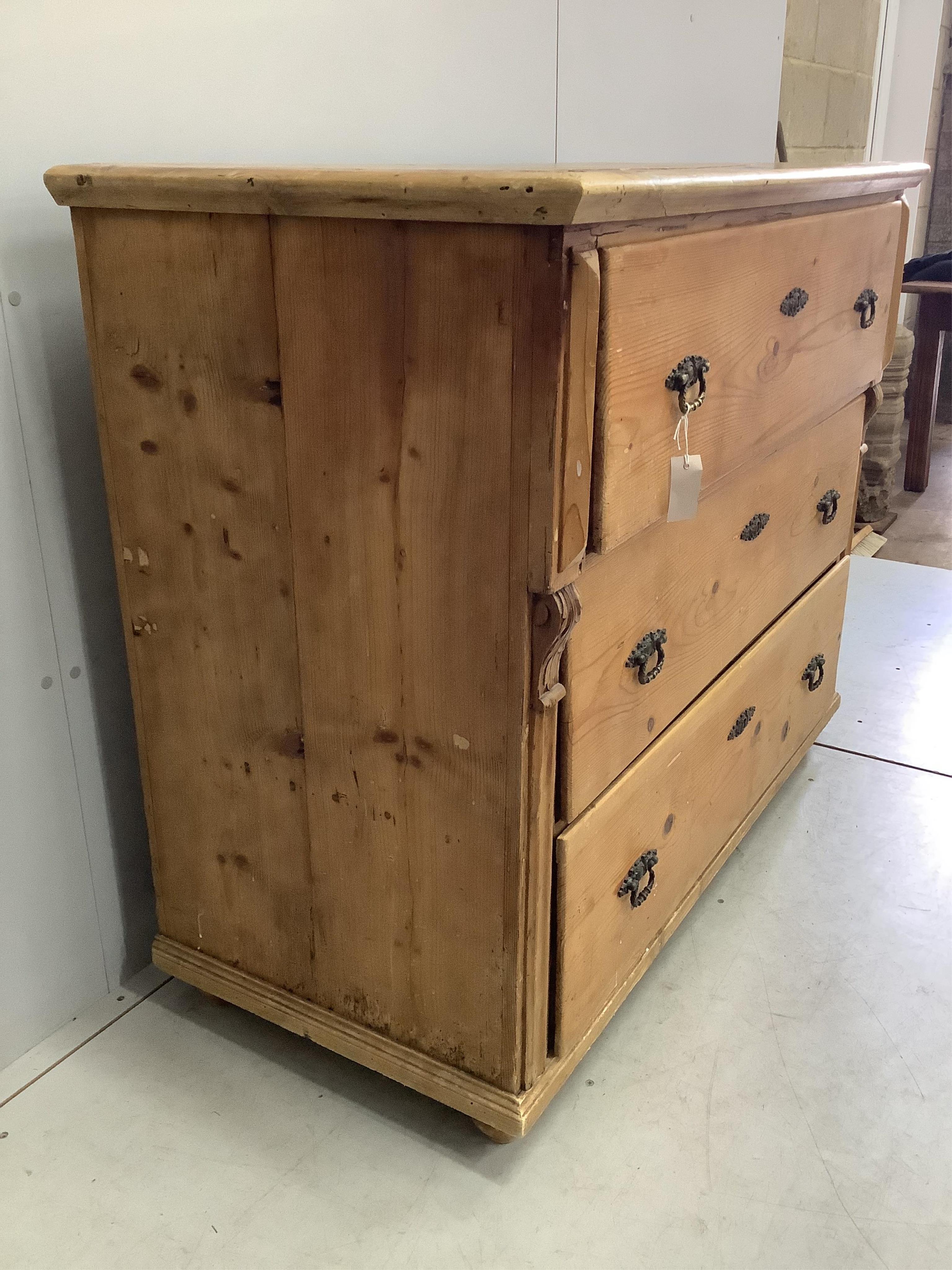 A 19th century Continental pine three drawer chest, width 126cm, depth 59cm, height 104cm. Condition - fair